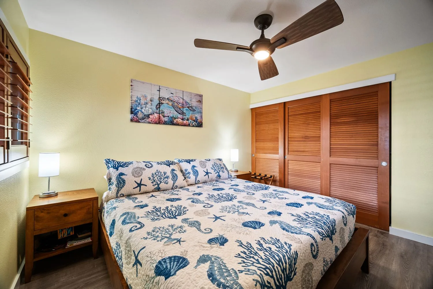 Bedroom with bed, closet, and nightstand
