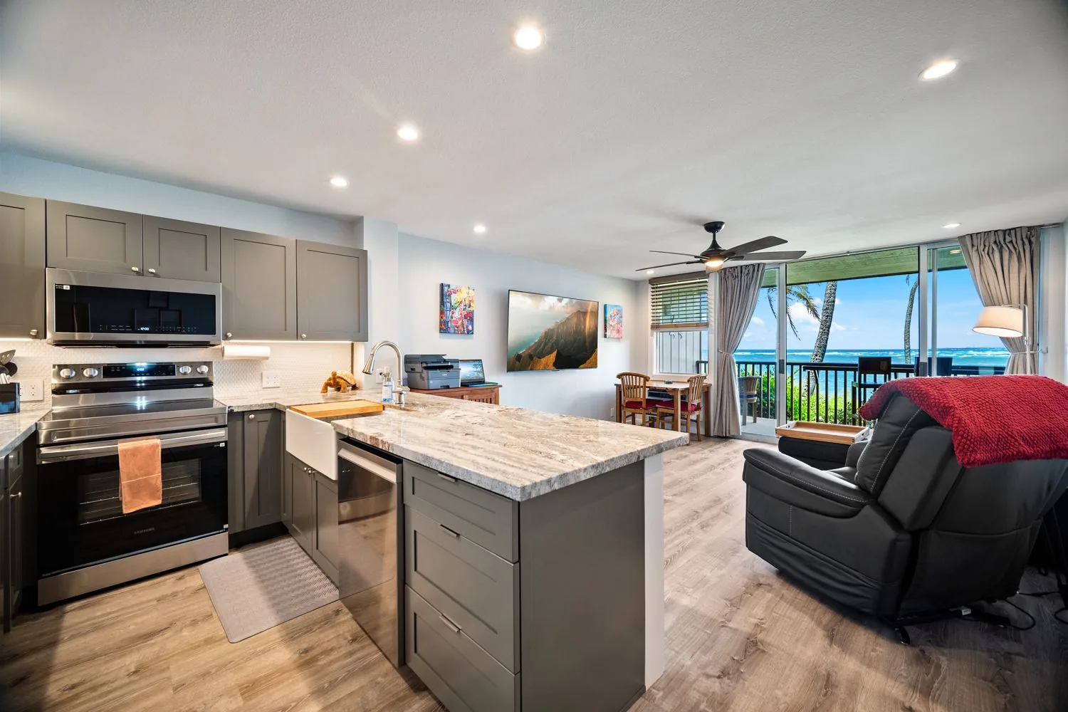 Open living room and kitchen with ocean view